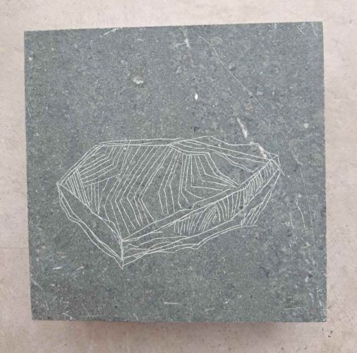 <h2>Extraction Study 1, 2022</h2> <p><!-- wp:paragraph -->
<p>The 'extraction study' series was created using performative drawings or 'extracted' marks on different fragments of stone. The marks were made using symbolic lengths of time  - a ratio (minutes to days) of the time that particular stone had taken to reach the stonemason's yard from its original place of mining and extraction. </p>
<!-- /wp:paragraph -->

<!-- wp:paragraph -->
<p>Creating this work I was interested in the idea of using the symbolism for extraction in a durational performance to criticise the harmful extraction of stones by human hands. </p>
<!-- /wp:paragraph --></p>